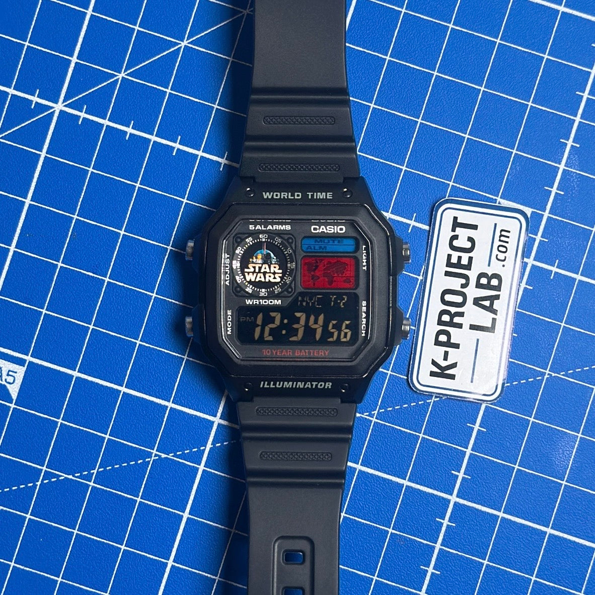 K-Project Labin Casio AE-1200 Imperial Wars mustana hartsina, ranneke suorassa matolla